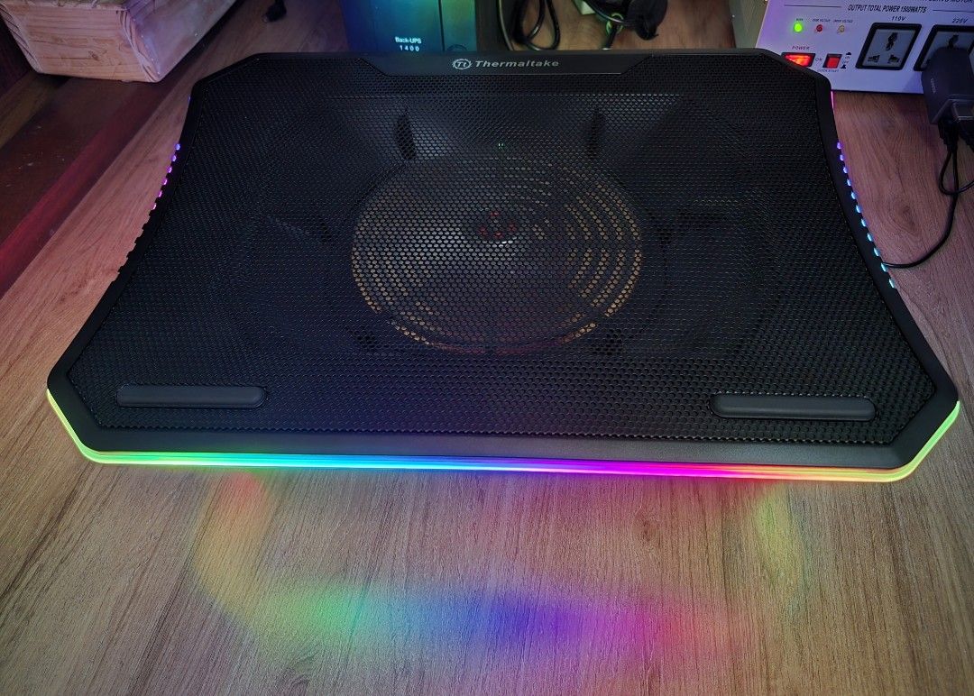 Thermaltake Massive 20 RGB Laptop Cooler (Category: Laptops & Notebooks) located in Pasig City. Submitted by anythinggoes888 (Listing ID 1401572852, Image 2). Description: Thermaltake Massive 20 RGB LED-lit with 5 lighting modes laptop cooler. - 3 levels of adjustable height. - Laptop size from 10 to 19 inches -Features a 200mm large fan and metal mesh surface for optimal cooling. Includes a USB cable for power. The cooler has RGB lighting along 