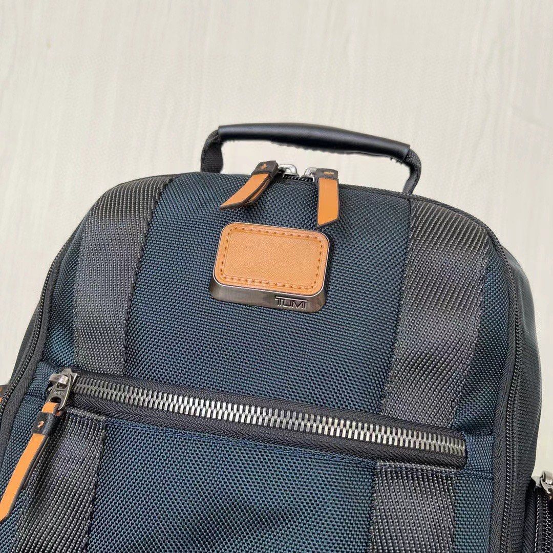 Tumi Alpha Bravo Sheppard De luxe Laptop Backpack (Category: Backpacks) located in Manila. Submitted by bagmaniaph (Listing ID 1401678262, Image 2). Description: This impressive Sheppard deluxe backpack has a bevy of interior and exterior organizational pockets as well as dedicated space for a laptop, iPad and other digital essentials. Exterior pockets include a waterproof pocket for a water bottle or umbrella. Made from an exceptionally durable 