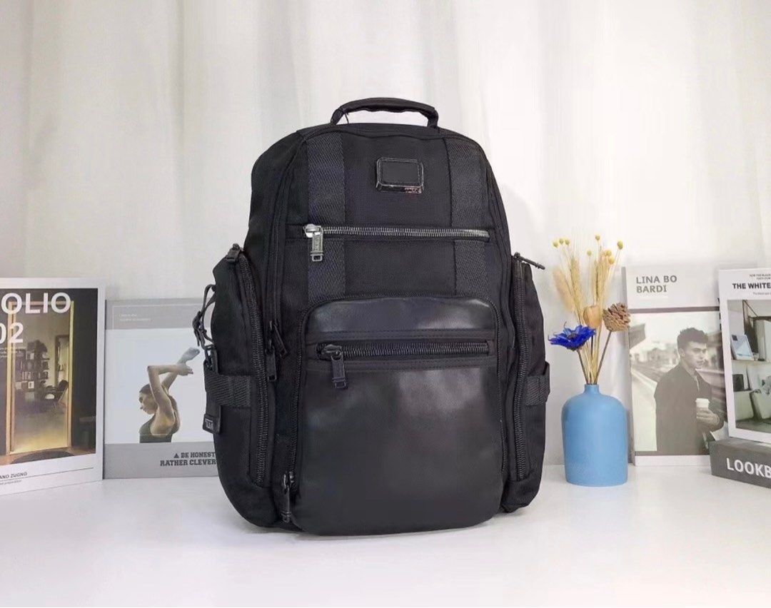 Tumi Alpha Bravo Sheppard Deluxe Laptop Backpack (Category: Backpacks) located in Manila. Submitted by bagmaniaph (Listing ID 1401687800, Image 1). Description: This impressive Sheppard deluxe backpack has a bevy of interior and exterior organizational pockets as well as dedicated space for a laptop, iPad and other digital essentials. Exterior pockets include a waterproof pocket for a water bottle or umbrella. Made from an exceptionally durable f