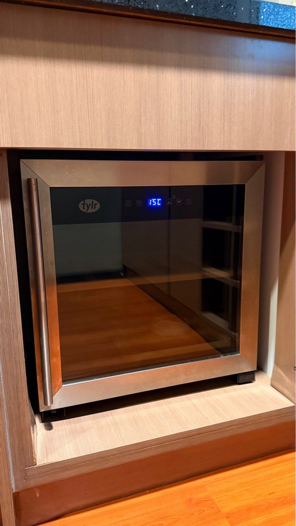 Tylr Wine Cooler (Category: Refrigerators and Freezers) located in Taguig. Submitted by peanutbutterlove (Listing ID 1401637094, Image 1). Description: TYLR 17 Bottle Compressor Wine Cooler Specifications Model No.: TYL-KWS17 Rated Voltage: 220-240V 60Hz Rated Current: 1A Rated Power: 90W Climate Type: ST Total Effective Volume: 43L Refrigerant Charge: R600a/25g Gross Weight: 24.5 k Net Weight: 23 kg Item Dimension: 48 x 43 x 50.8 cm Features - 1