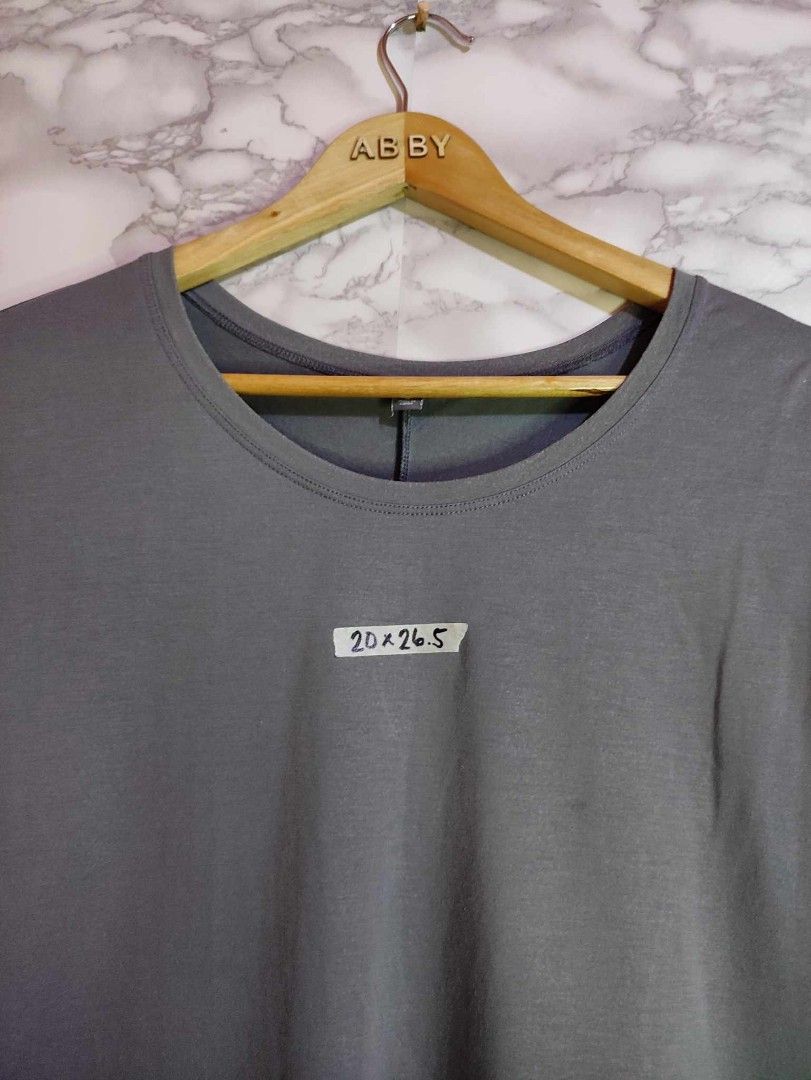 Uniqlo drape half sleeve (Category: Shirts) located in Bulacan. Submitted by 2nd_base (Listing ID 1401708395, Image 2). Description: dimensions: width 20 length 26.5 excellent condition, no issue.