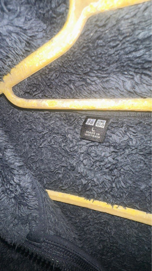 Uniqlo Fleece Jacket - Dark Grey - L (Category: Coats, Jackets and Outerwear) located in Manila. Submitted by omenagi (Listing ID 1401655540, Image 3). Description: - Uniqlo fleece jacket - Size: L (Can fit Medium well) - Color: Dark Grey - Features: Full zip, stand-up collar, 2 side pockets - Made in Vietnam - Perfect for layering.