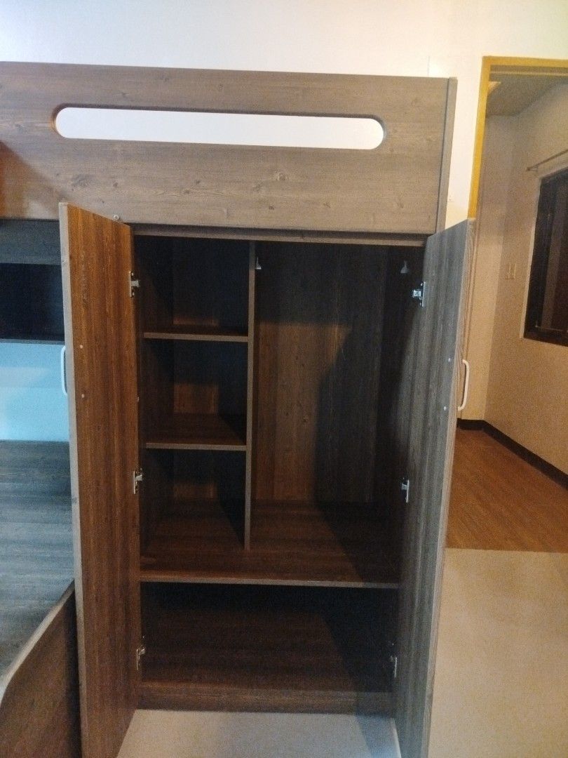 Wooden Bunk Bed with Storage and Ladder (Category: Bed Frames & Mattresses) located in Manila. Submitted by liz.clutters (Listing ID 1401675954, Image 3). Description: NEGOTIABLE!! READ ME original price is 30-35k - Wooden bunk bed - Built-in ladder - Storage cabinets and drawers - Top bunk with safety rails (Single Size Bed) - Lower bunk with drawers (Queen Size bed) - Warm wood vinyl finish - Includes multiple shelves - Space-saving design Issu