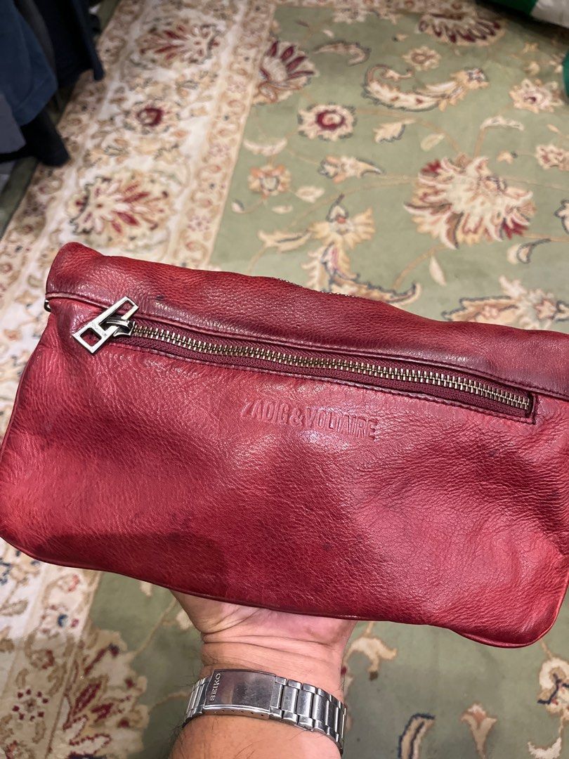 Zadig & Voltaire Skull Embellished Shoulder Bag (Category: Luxury Bags & Wallets) located in Cagayan de Oro. Submitted by gdsteals (Listing ID 1401651388, Image 3). Description: - Zadig & Voltaire shoulder bag - Red leather - Skull and stud embellishment - Chain strap - Zip closure - Embossed brand name - Stylish and edgy design.