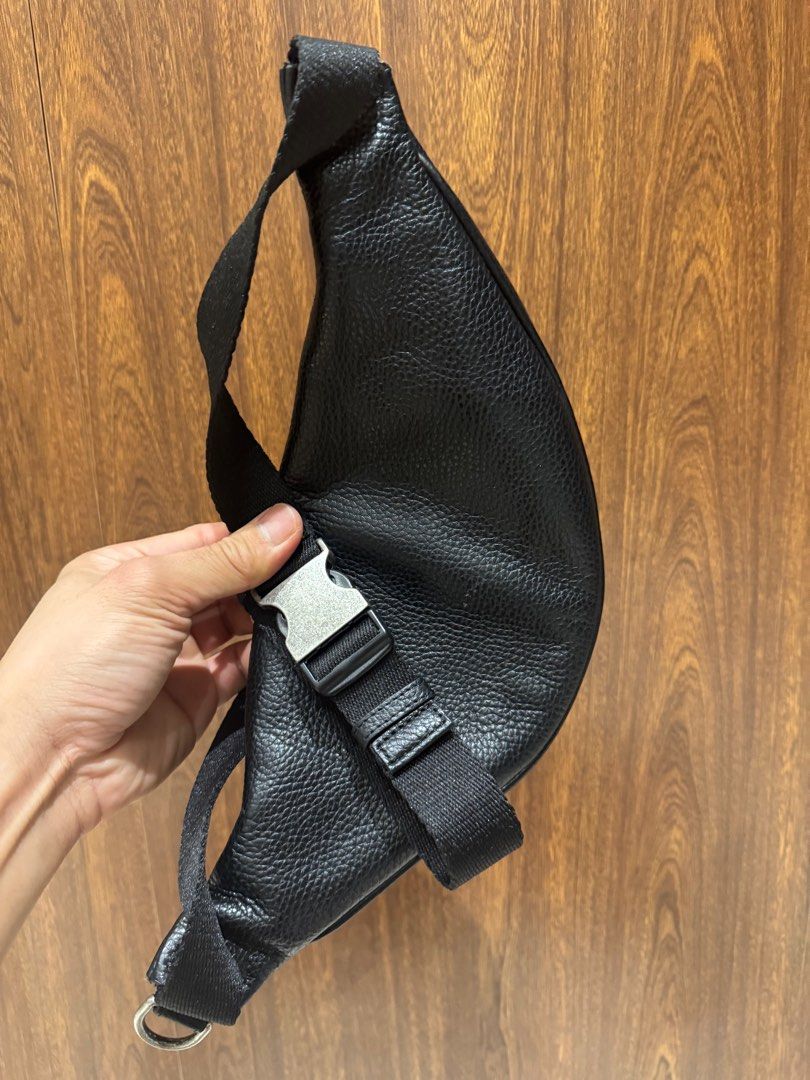 Zara Man Black Leather Belt Bag (Category: Belt bags, Clutches and Pouches) located in Marikina City. Submitted by snclr (Listing ID 1401680578, Image 3). Description: Zara Man Black Leather Belt Bag with Adjustable belt. Used once 10/10.