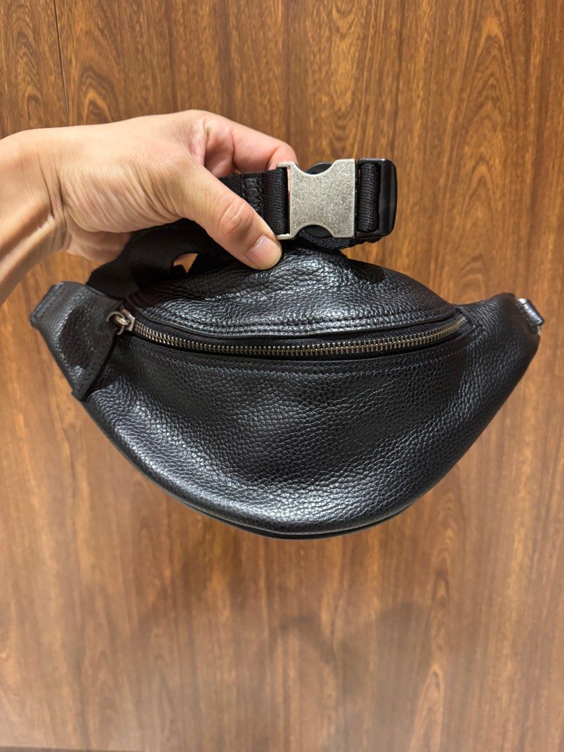 Zara Man Black Leather Belt Bag (Category: Belt bags, Clutches and Pouches) located in Marikina City. Submitted by snclr (Listing ID 1401680578, Image 2). Description: Zara Man Black Leather Belt Bag with Adjustable belt. Used once 10/10.