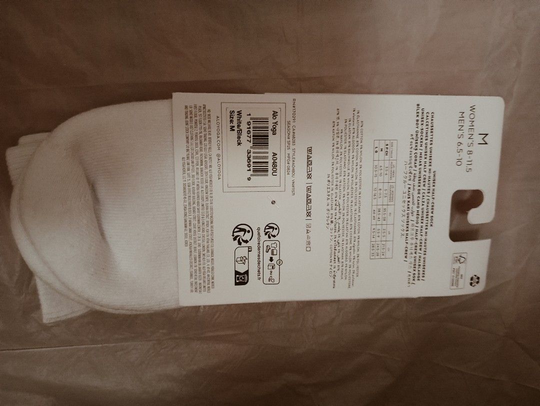 Alo Yoga Unisex Half-Crew Socks - White - Size M (Category: Socks) located in Singapore. Submitted by bookstand (Listing ID 1403388150, Image 3). Description: Brand new Alo Yoga unisex half-crew socks in white. Size M. Features the Alo logo and black stripes. Perfect for workouts or everyday wear. Comes with original packaging. Tag: alo socks, socks, unisex socks, Christmas, alo yoga, athleisure, Lululemon, sports socks, sports, decathlon, addida