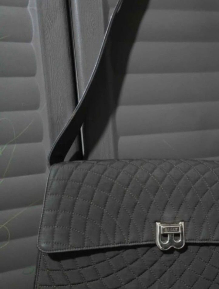 Bally Quilted Shoulder Bag (Category: Luxury Bags & Wallets) located in Manila. Submitted by muliph (Listing ID 1403376864, Image 2). Description: - Bally black quilted shoulder bag - Flap closure with silver-tone 'B' logo - Comfortable shoulder strap - Soft material - Quilted pattern on front and sides.