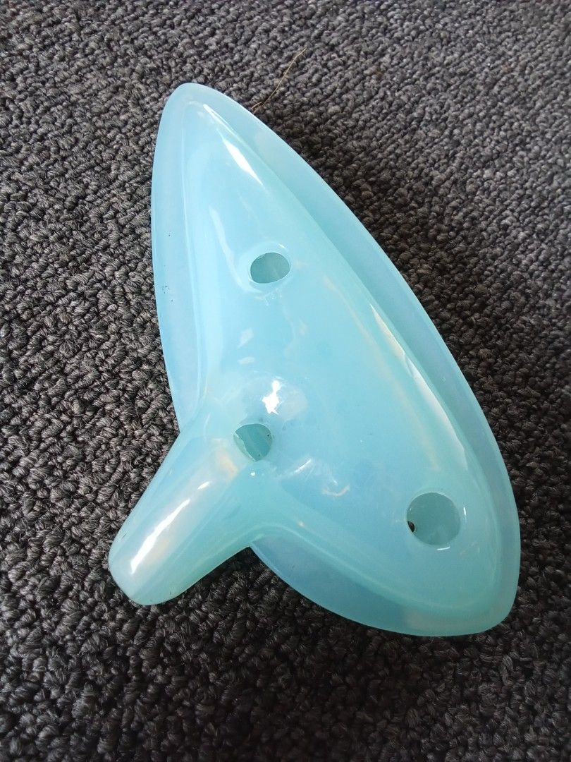 Blue Ocarina (Category: Musical Instruments) located in Bocaue. Submitted by marajapansurplus (Listing ID 1403252207, Image 2). Description: - Light blue ocarina - Made of durable plastic - Features a teardrop shape - Includes a mouthpiece - Perfect for beginners.