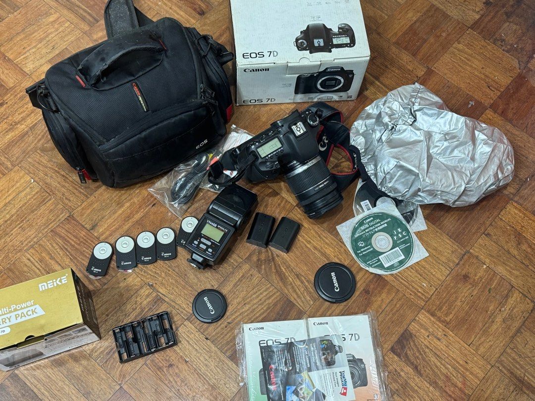 Canon 7D Photographer Set (Category: Cameras) located in Manila. Submitted by aladinhear96269 (Listing ID 1403394473, Image 1). Description: This Canon 7D is rarely used. With Box, manual, drivers, and wires. Probably less than 1k actuations. Kept and stored properly. Take All! This is a good deal for aspiring photographers/hobbyists. Even for gadget resellers! Included/As Freebies: External Flash Speedlite 2 Original Canon Batteries Battery Pack