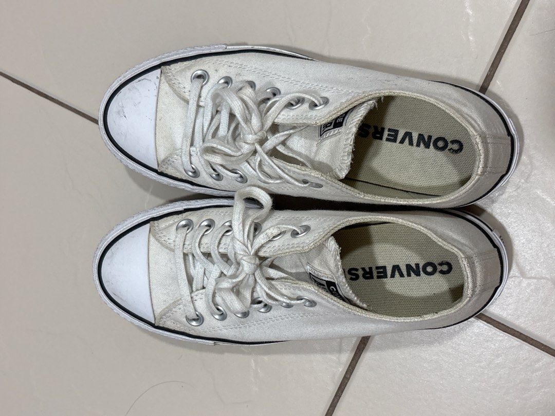 Converse Chuck Taylor All Star White Sneakers (Category: Sneakers) located in Mandaluyong City. Submitted by annab11 (Listing ID 1403251490, Image 1). Description: - Classic white Converse Chuck Taylor All Star sneakers - Iconic Converse logo on insole - White laces and canvas upper - Black stripe on sole - White toe cap.