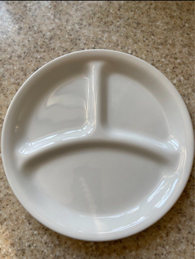 Corelle Divided Dish Plate - set of 4 (Category: Dinnerware & Cutlery) located in Manila. Submitted by shopaholic_gurl (Listing ID 1403309086, Image 3). Description: Set of 4 Corelle ceramic divided plates Dishwasher safe for long lasting patterns Microwave and oven use for versatility Break and chip resistance for carefree durability Stackability for cupboard space efficiency Each plate has three compartments. plates are white and appear to be m