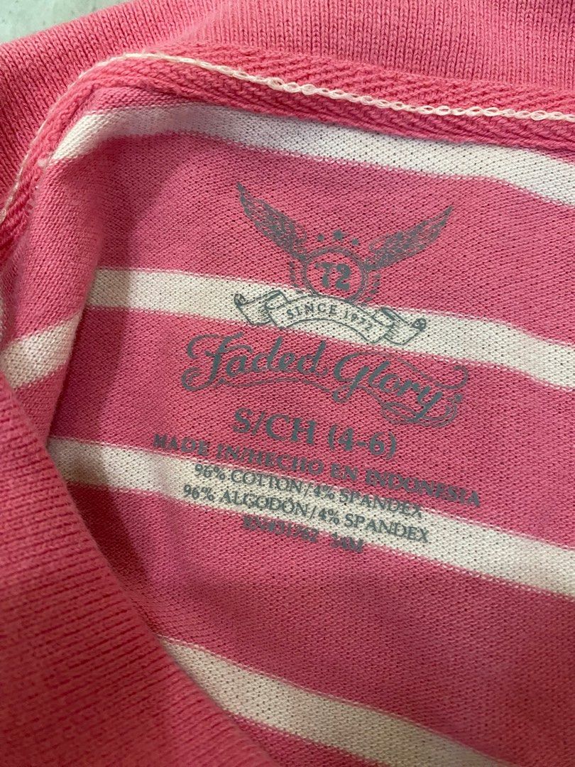 Faded Glory Pink Striped Polo Shirt (Category: Blouses) located in Cavite. Submitted by piawurtzface (Listing ID 1403389864, Image 3). Description: Pink and white striped polo shirt from Faded Glory. Features a collared neckline and short sleeves. The shirt has a button-up placket. Made of 96% cotton and 4% spandex. Size S/CH (4-6)..