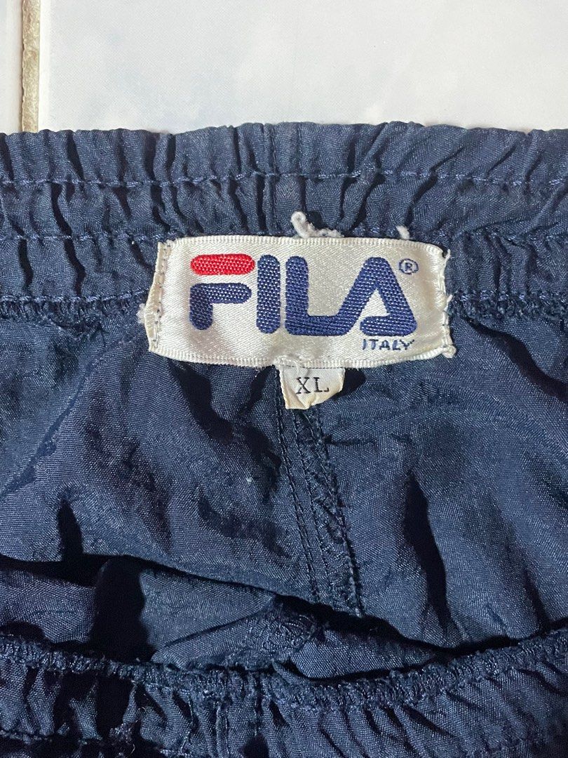 FILA TRACKPANTS (Category: Activewear) located in Makati City. Submitted by berto01 (Listing ID 1403403431, Image 3). Description: fila tackpants (vintage) 90’s 21x43 lightweight issue: garter is kind of loose.