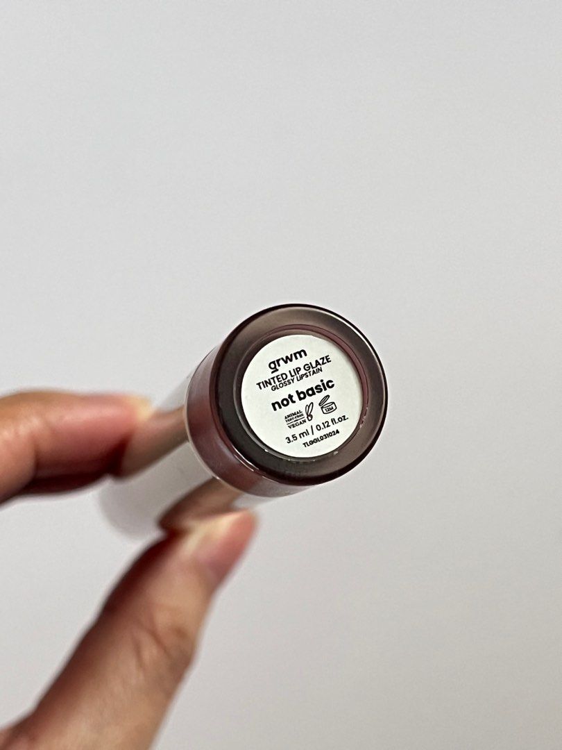 GRWM Tinted Lip Glaze (not basic) (Category: Makeup) located in Mandaluyong City. Submitted by everythingnice__ (Listing ID 1403339000, Image 2). Description: swatch only twas a gift hehe shade : not basic!.