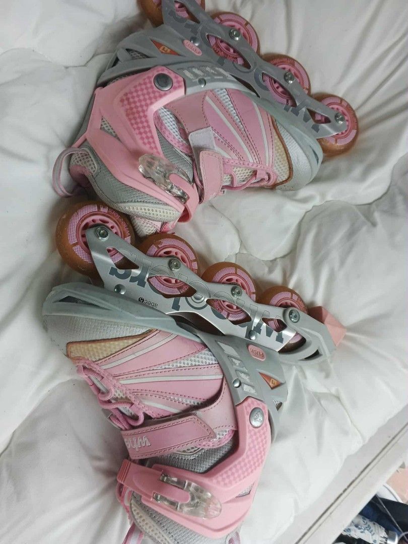 INLINE SKATE ADJUSTABLE SIZE (Category: Skates, Rollerblades & Scooters) located in Caloocan City. Submitted by youngdog_7a3ee7 (Listing ID 1403247811, Image 2). Description: - Wheelers inline skates - Pink and gray color scheme - Orange wheels - Secure buckle closure - Size indicated on inner tag.