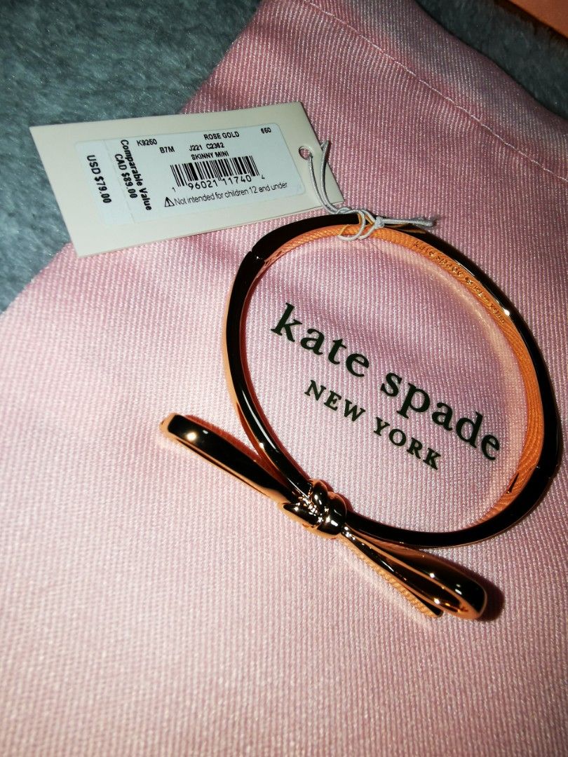 Kate Spade Bangle (Category: Bracelets) located in Pasig City. Submitted by puggable (Listing ID 1403414409, Image 3). Description: New / Kept Unused Kate Spade Bow Bangle in Rose Gold With KS Pink Pouch Guaranteed Authentic Bought from US **Decluttering**.
