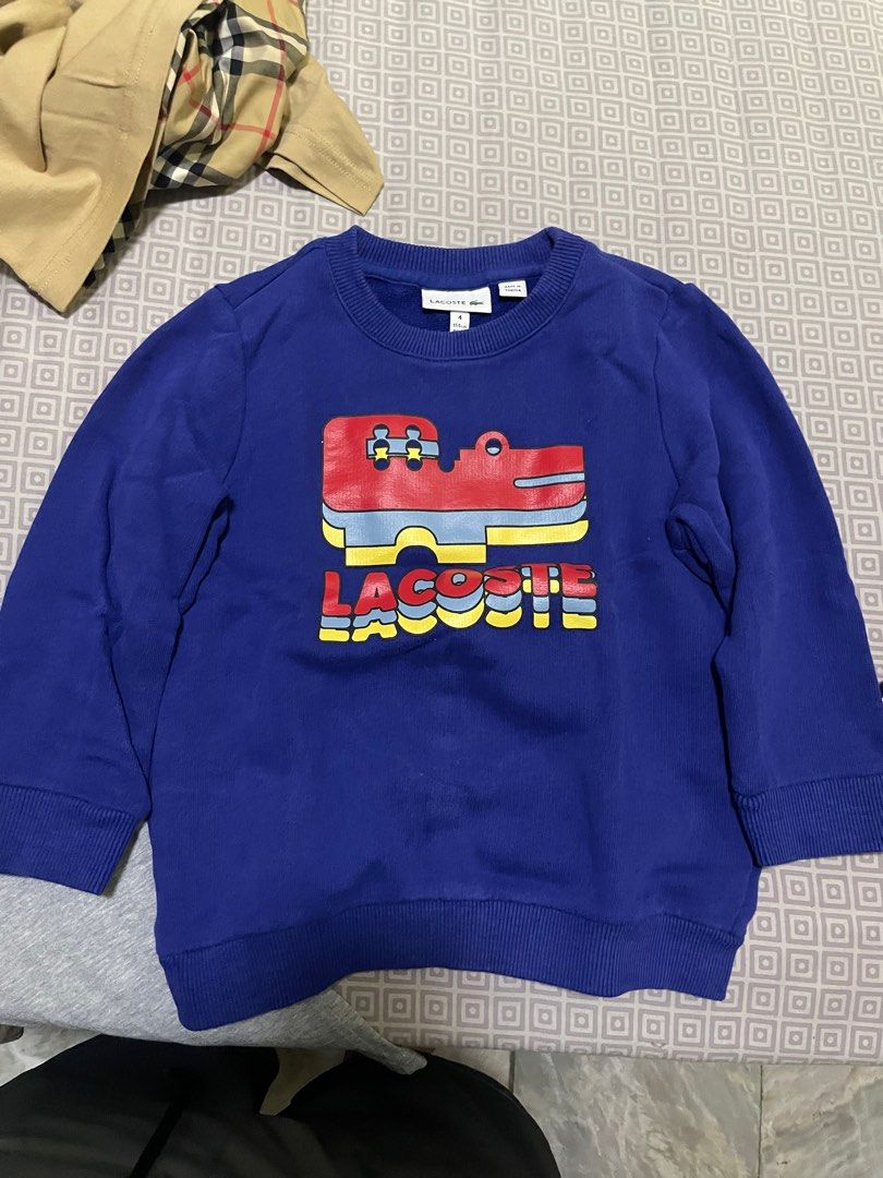 LACOSTE SWEATER (Category: Babies & Kids Fashion) located in Imus. Submitted by jrueee (Listing ID 1403291745, Image 1). Description: PM FOR MORE IMAGES AND QUESTIONS.