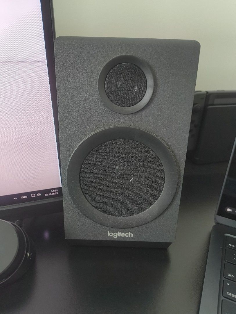 Logitech Z333 Speaker System (Category: Soundbars, Speakers & Amplifiers) located in Manila. Submitted by lodburger (Listing ID 1403285074, Image 1). Description: - Logitech Z333 speaker system - Includes subwoofer and two satellite speakers - Features a control pod with power indicator - Sleek black design - Logitech logo visible on speakers - Subwoofer with side port.