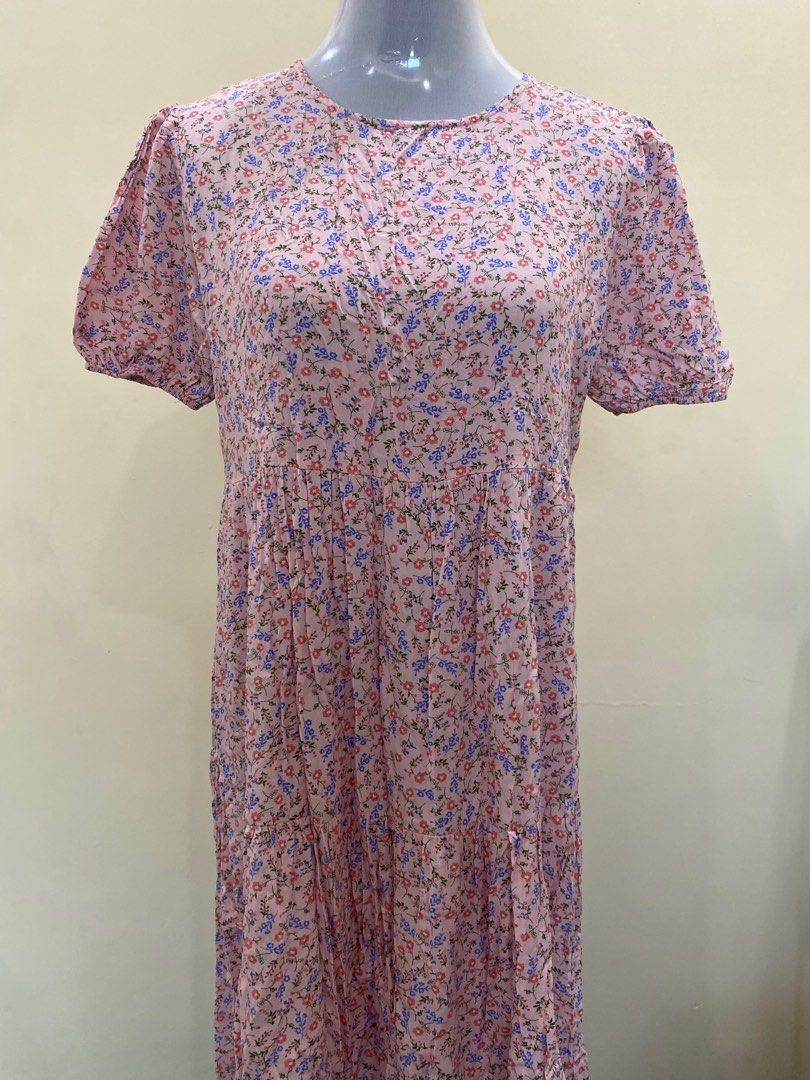 Lovito Floral Dress (Category: Dresses) located in Cavite. Submitted by piawurtzface (Listing ID 1403390245, Image 1). Description: Dress features a lovely floral print in pink, blue, and green. It has short, puffed sleeves and a round neckline. The tag indicates it is a size EU 34 and US 4..
