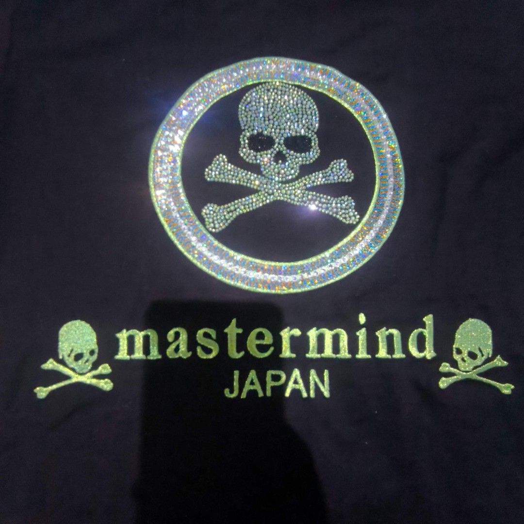 Mastermind Japan Skull T-shirt (Category: Shirts) located in Pasig City. Submitted by tomden (Listing ID 1403265841, Image 2). Description: - Mastermind Japan T-shirt - Black color - Size M -Width - 17" -Length - 26" - Eye-catching neon green skull and crossbones logo - Crew neck and short sleeves - Made from 100% cotton - Includes washing instructions.