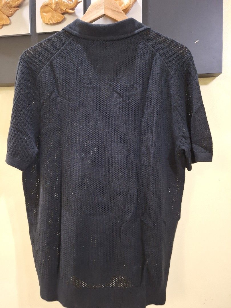 Michael Kors knitted polo shirt (Category: Tshirts & Polo Shirts ) located in Malolos. Submitted by les0802 (Listing ID 1403364851, Image 3). Description: Michael Kors knitted polo shirt Men's shirt Medium Php 1,500 plus shipping fee ** Color may vary due to lighting.