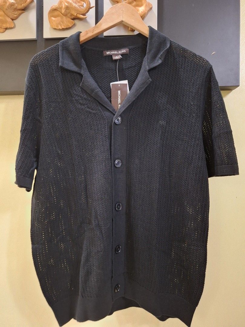 Michael Kors knitted polo shirt (Category: Tshirts & Polo Shirts ) located in Malolos. Submitted by les0802 (Listing ID 1403364851, Image 2). Description: Michael Kors knitted polo shirt Men's shirt Medium Php 1,500 plus shipping fee ** Color may vary due to lighting.