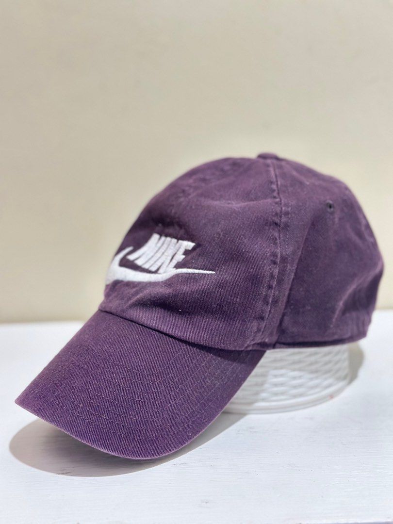 Nike Cap (Category: Caps & Hats) located in Pasay City. Submitted by icemc (Listing ID 1403298235, Image 1). Description: - Nike Heritage 86 cap - Deep purple color - Features the Nike logo - Adjustable strap for a comfortable fit - Made of cotton and polyester.