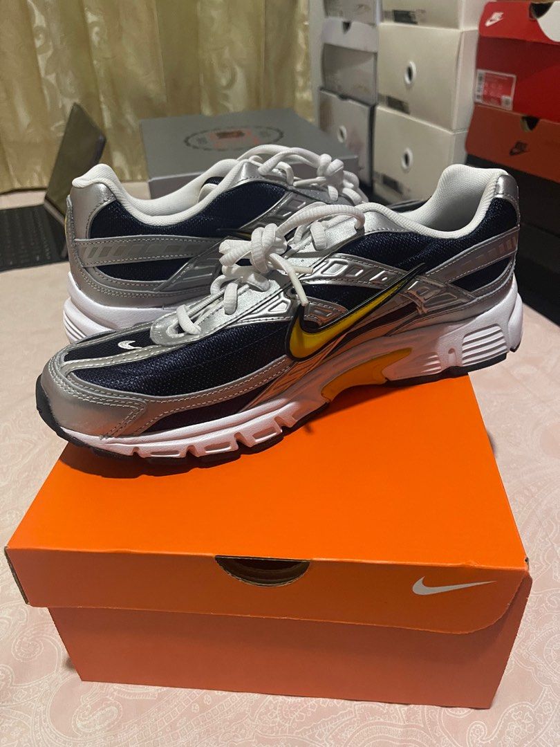NIKE INITIATOR OBSIDIAN SILVER GOLD (Category: Sneakers) located in Quezon City. Submitted by 14iamney (Listing ID 1403236015, Image 3). Description: NIKE Initiator SKU: IB4467-451 Obsidian/ Metallic Silver/ White/ Team Gold Sizes (US): 11 Price: ₱3,300 ea Shipping Fee/ Pick Up c/o BUYER Loc: Abao St. Laloma Quezon City.