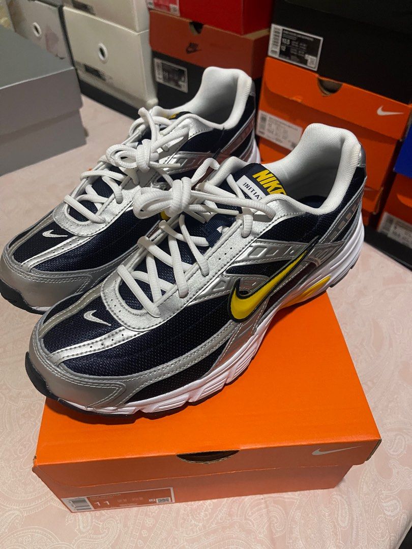 NIKE INITIATOR OBSIDIAN SILVER GOLD (Category: Sneakers) located in Quezon City. Submitted by 14iamney (Listing ID 1403236015, Image 1). Description: NIKE Initiator SKU: IB4467-451 Obsidian/ Metallic Silver/ White/ Team Gold Sizes (US): 11 Price: ₱3,300 ea Shipping Fee/ Pick Up c/o BUYER Loc: Abao St. Laloma Quezon City.