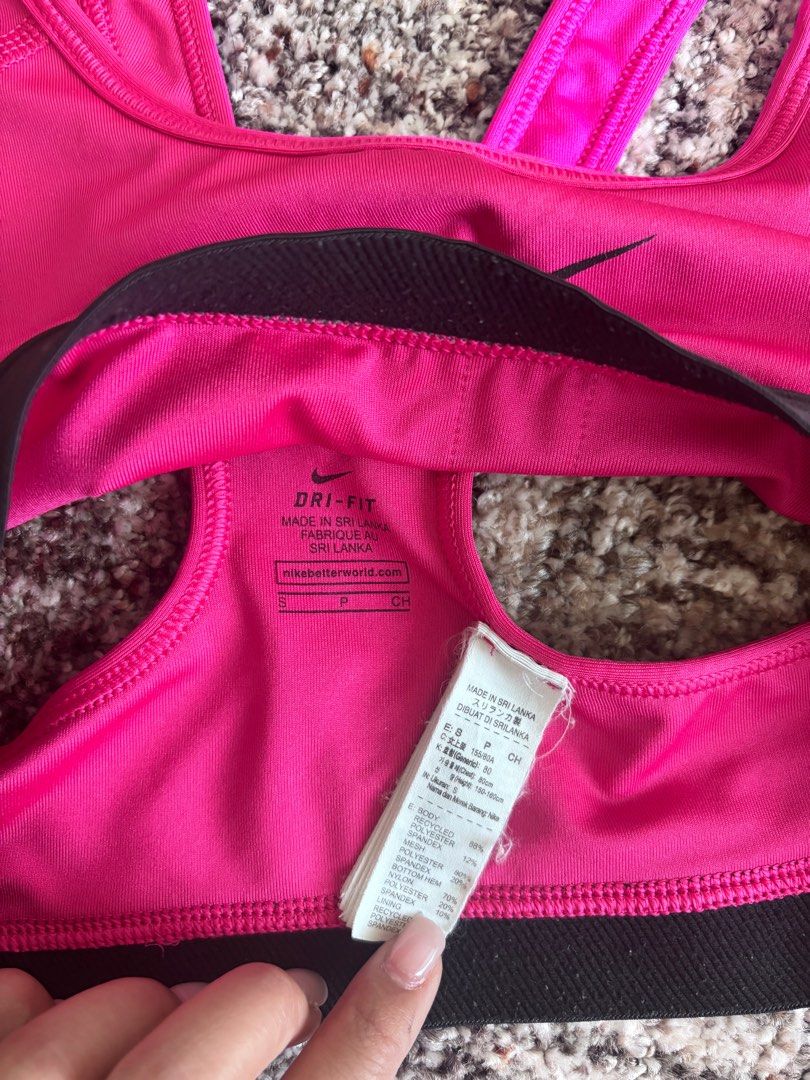 Nike Pro Sports Bra - Pink (Category: Activewear) located in Malabon City. Submitted by jesabibi (Listing ID 1403298936, Image 2). Description: - Authentic Nike Pro sports bra - Vibrant pink color - Size: Small (S) - Black band with Nike Pro logo - Ideal for workouts and everyday wear.