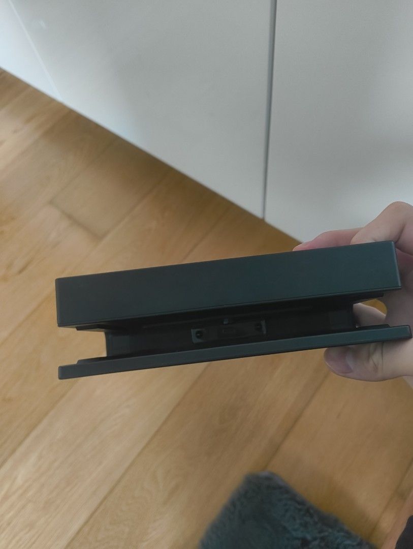 Nintendo Switch Dock and Controller (Category: Controllers) located in Manila. Submitted by lodburger (Listing ID 1403286853, Image 3). Description: - Nintendo Switch dock included (black, Nintendo logo). - Controller included (black and red, unique design) - Enhance your gaming experience!.