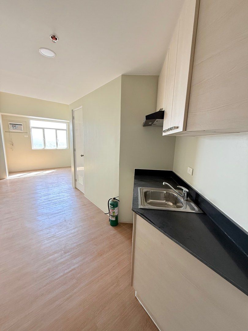 No lumpsum downpayment - studio unit (Category: Apartments & Condos) located in Manila. Submitted by romadvill95636 (Listing ID 1403363494, Image 2). Description: Studio unit 22sqm. Great view. Amenities include swimming pool, study room in the common area, and a gym. Prime location across Ateneo. Good investment to lease in a high deman area surrounded by schools and offices. Starbucks in the building. Marketplace and Supermarket. Unit semi-furn