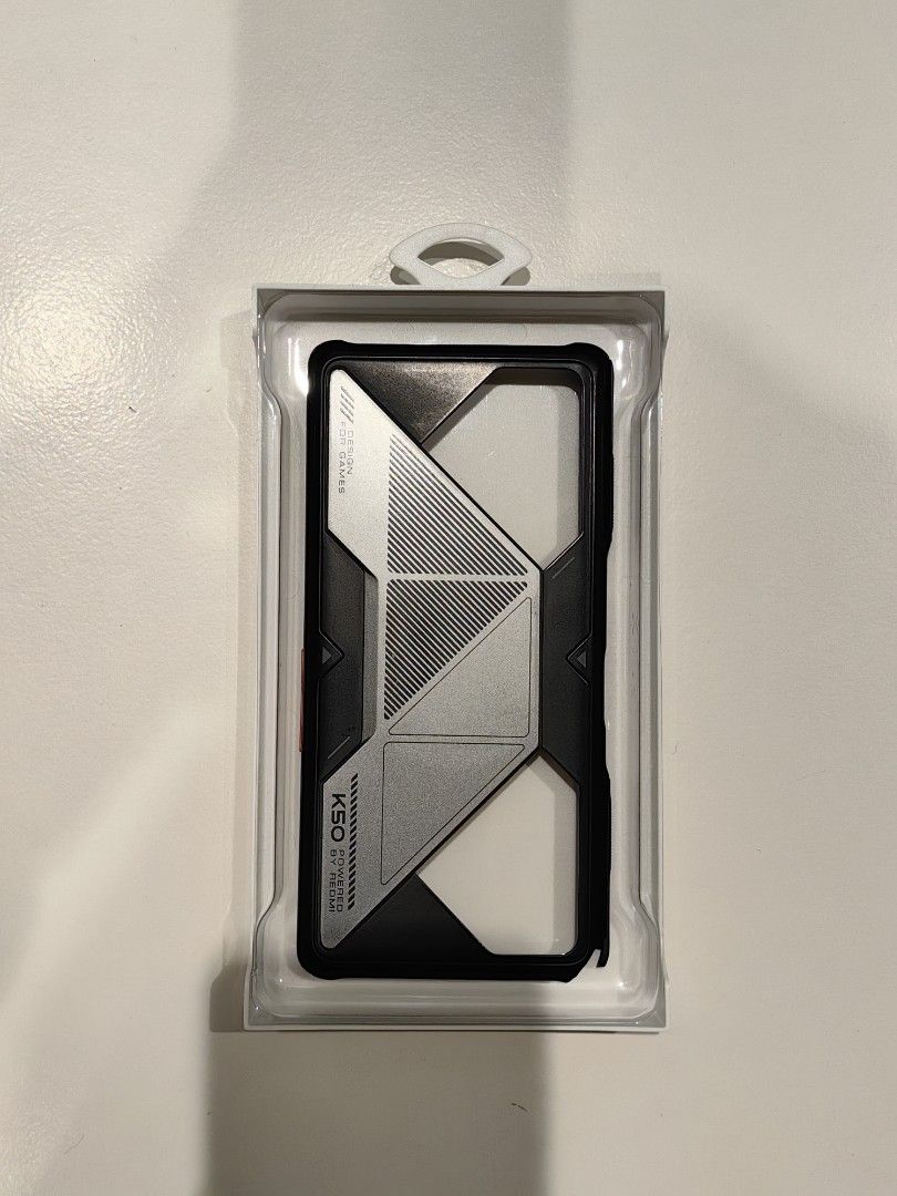 Poco F4 GT/Redmi K50 Gaming Gaming Phone Case (Category: Cases & Covers) located in Chemor. Submitted by phanshuosheng (Listing ID 1403266349, Image 1). Description: Poco F4 GT/Redmi K50 Gaming gaming phone case Left part of the phone case is broken but pop up trigger can still be used with this phone case on.