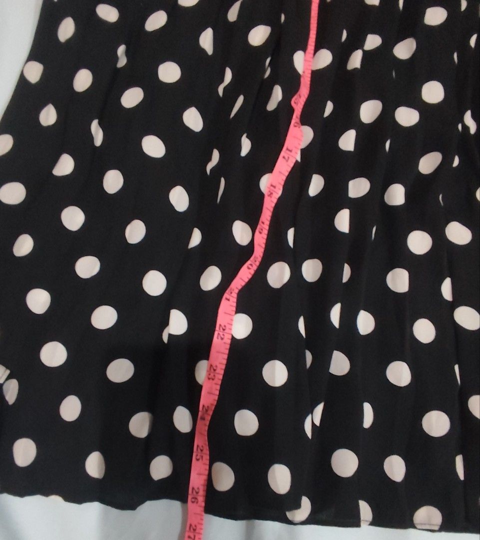Polka Dot Pleated Skirt (Category: Skirts) located in Quezon City. Submitted by melsc (Listing ID 1403348537, Image 2). Description: - Black midi skirt with white polka dots - Pleated design - Approximately 27 inches in length - Elasticized waist.