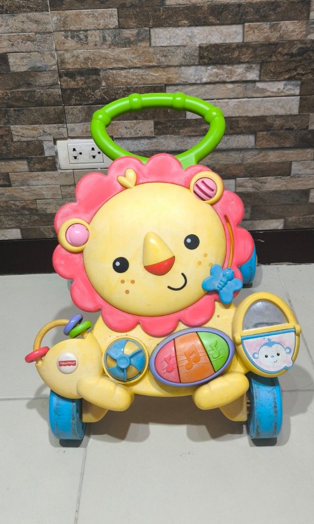 Pre loved fisher price push walker (Category: Infant Playtime) located in Paranaque City. Submitted by cherishop.ph (Listing ID 1403335202, Image 2). Description: what you see is what you get. not sure if the sounds still working..