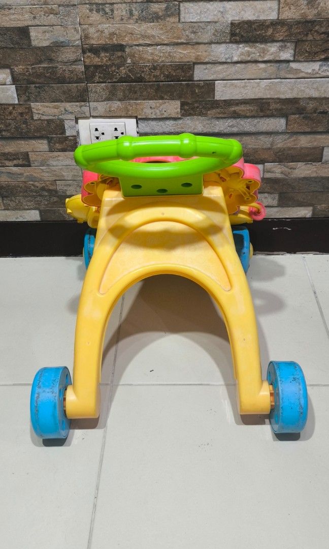 Pre loved fisher price push walker (Category: Infant Playtime) located in Paranaque City. Submitted by cherishop.ph (Listing ID 1403335202, Image 3). Description: what you see is what you get. not sure if the sounds still working..