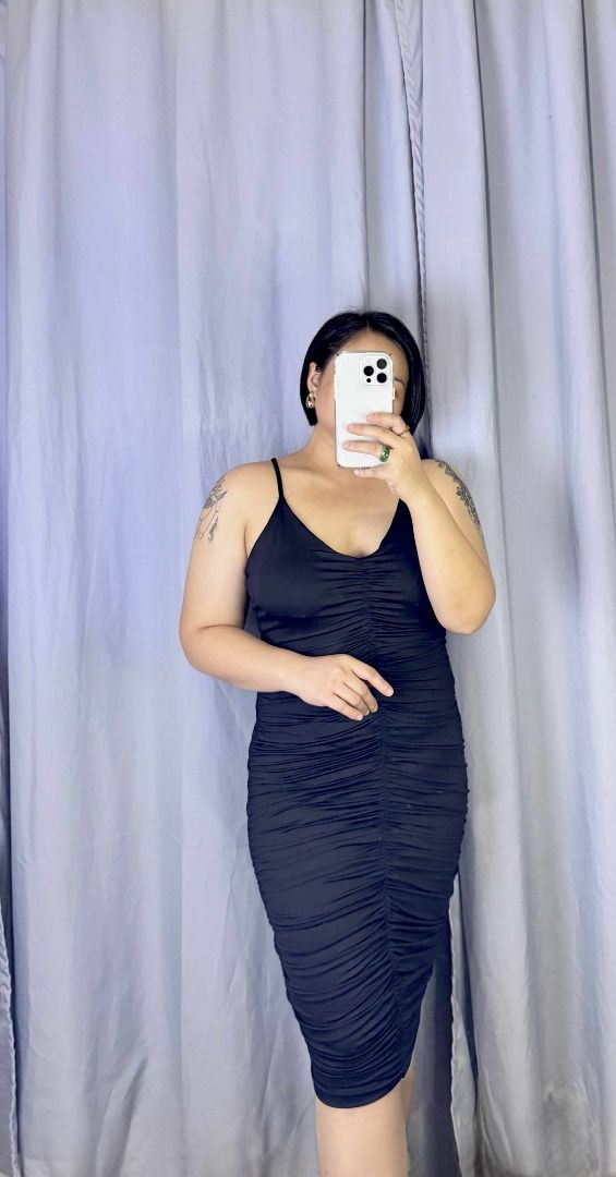 Pre-loved Black Bodycon Midi Dress (Category: Dresses) located in Angeles City. Submitted by kaleah_2021 (Listing ID 1403349002, Image 2). Description: - Pre-loved - XS - XL - Stretchable + HQ fabric - L: 34 - Elegant black midi bodycon dress - Flattering ruched design - Fitted silhouette - Midi length - Perfect for a night out or special occasion.
