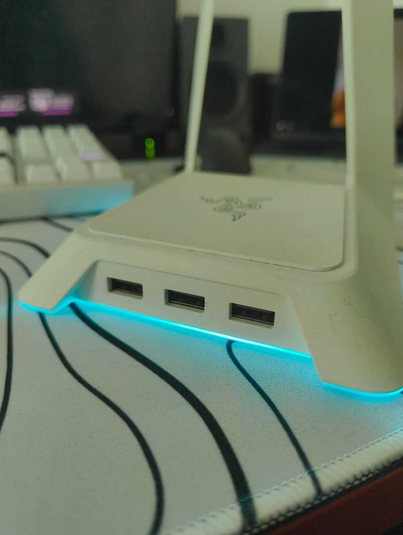 Razer Chroma Headphone Stand (Category: Headphones & Headsets) located in Manila. Submitted by lodburger (Listing ID 1403283307, Image 2). Description: Razer Chroma headphone stand features a sleek white design with built-in USB ports. It has a glowing LED base that adds a cool aesthetic to your setup. The stand is designed to hold your headphones securely and keep your desk organized. It also has the Razer logo on the top..