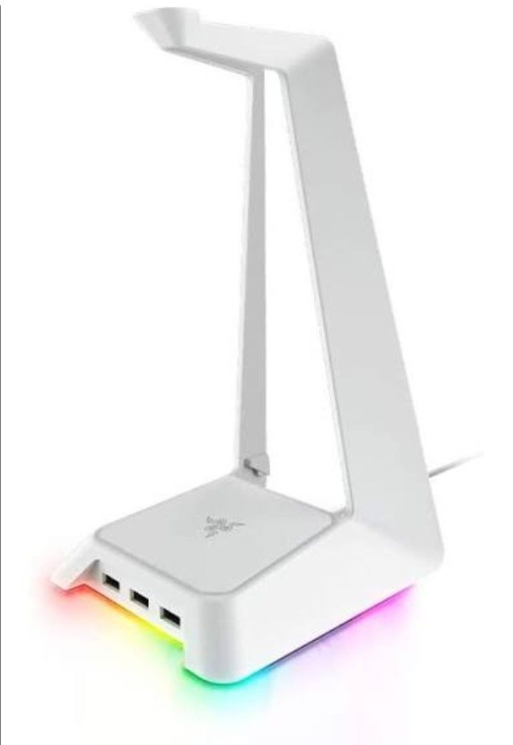 Razer Chroma Headphone Stand (Category: Headphones & Headsets) located in Manila. Submitted by lodburger (Listing ID 1403283307, Image 1). Description: Razer Chroma headphone stand features a sleek white design with built-in USB ports. It has a glowing LED base that adds a cool aesthetic to your setup. The stand is designed to hold your headphones securely and keep your desk organized. It also has the Razer logo on the top..