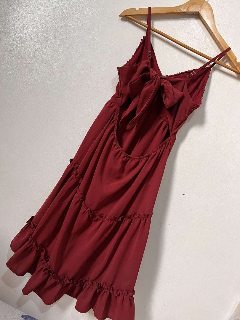 Ribbon back dress (Category: Dresses) located in Trece Martires City. Submitted by somecallitswagger (Listing ID 1403295650, Image 1). Description: Ribbon back tie ruffle dress good as new (excellent condition) S-M.
