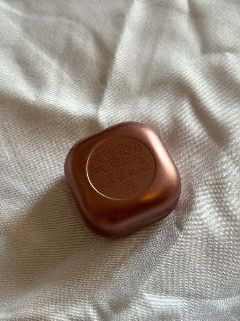 Samsung Galaxy Buds Pro (Category: Earphones) located in Manila. Submitted by pck_____ (Listing ID 1403306631, Image 3). Description: - Samsung Galaxy Buds Pro (rosegold color) - Case features "Samsung Sound by AKG" - Product information printed on the case.