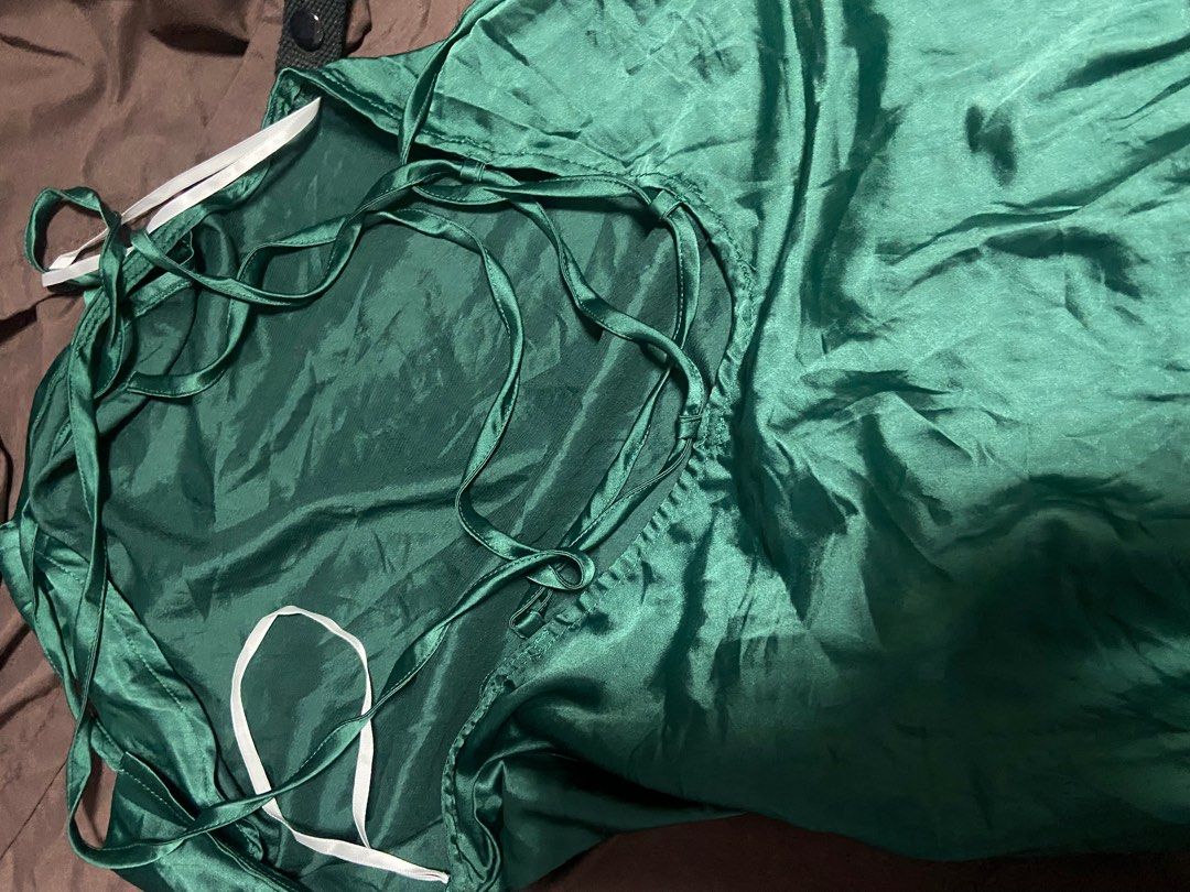 Shein Green Backless Evening Dress (Category: Evening dresses & gowns) located in Pasig City. Submitted by jamzdot (Listing ID 1403347693, Image 2). Description: - never used - not full length; stops at around ankle length - cute for weddings or dinners.