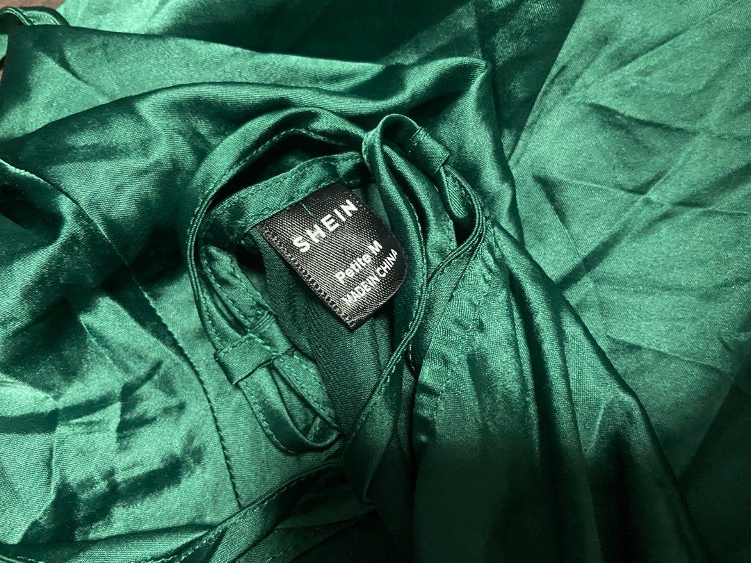 Shein Green Backless Evening Dress (Category: Evening dresses & gowns) located in Pasig City. Submitted by jamzdot (Listing ID 1403347693, Image 3). Description: - never used - not full length; stops at around ankle length - cute for weddings or dinners.