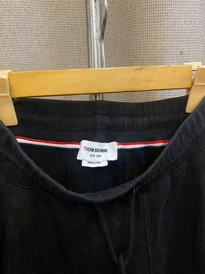 Thom Browne Black Sweatpants with White Stripes (Category: Joggers) located in Angeles City. Submitted by hunymoons (Listing ID 1403355121, Image 2). Description: Tom browne Jogger 25 laid flat to 30 waist, 36.5 length ₱700.