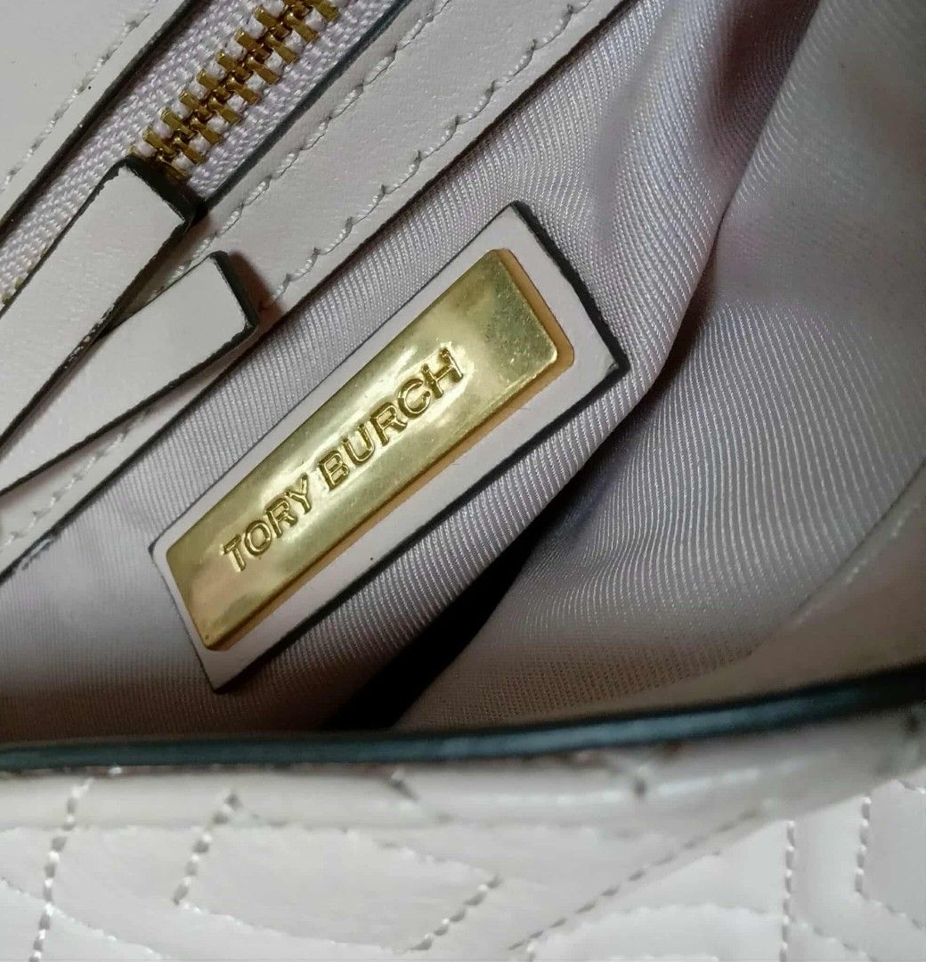 Tory Burch Sling Bag (Category: Luxury Bags & Wallets) located in Taguig. Submitted by esa.agustin (Listing ID 1403394942, Image 3). Description: Original Tory Burch leather blush pink sling bag..