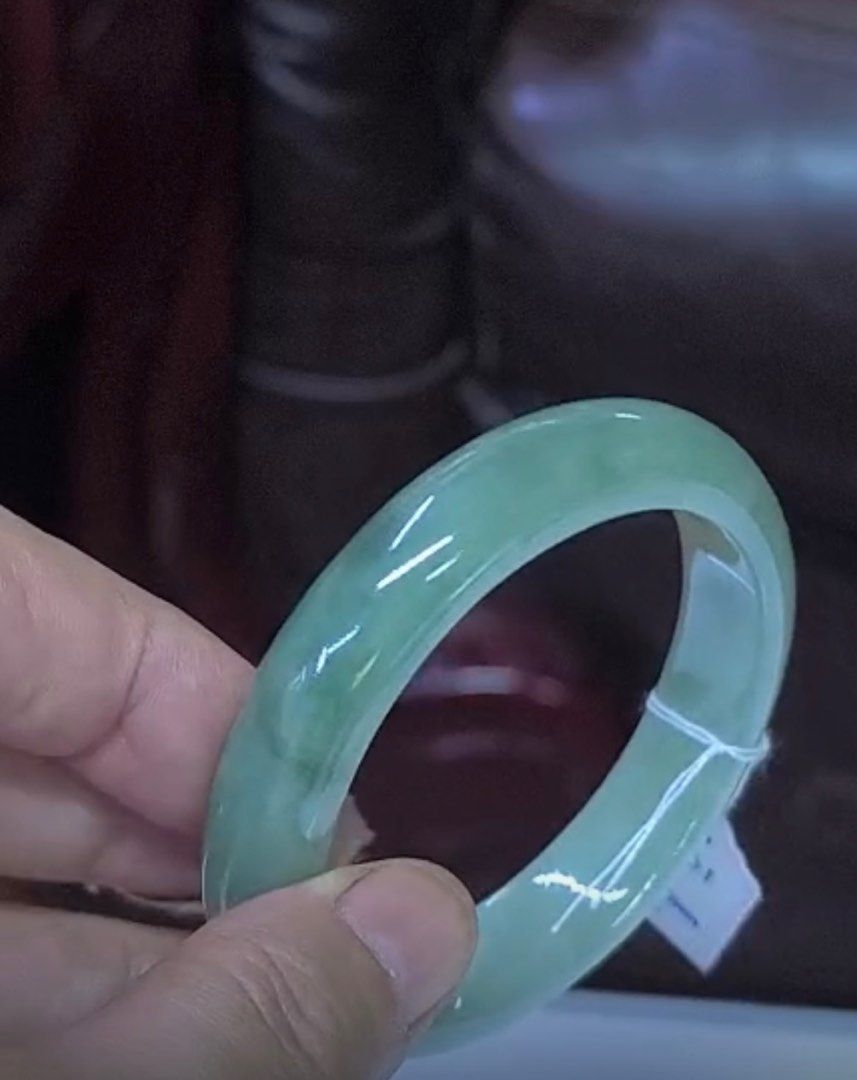 Translucent Jade Bangle Type-A (Category: Body Jewelry) located in Singapore. Submitted by juliapan2017 (Listing ID 1403400541, Image 2). Description: Natural A Jade Bangle from Myanmar Translucent Green Jade bangle, flawless, no defect Bangle size: 56mm Comes with certificate Meet at Sembawang MRT.