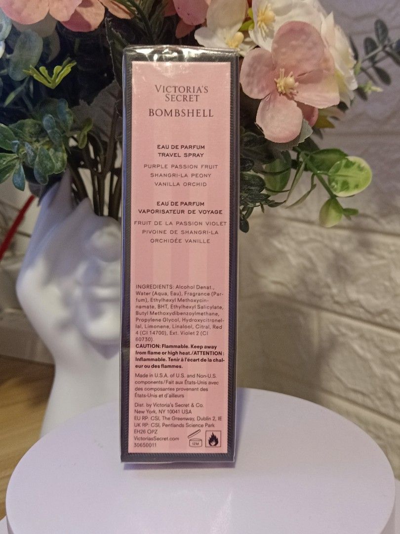 Victoria's Secret Bombshell Travel Spray (Category: Fragrance & Deodorants) located in Rodriguez. Submitted by applepink07 (Listing ID 1403376984, Image 2). Description: - Authentic Victoria's Secret Bombshell Eau de Parfum travel spray - 7ml / 0.25 fl oz - Fragrance notes: Purple passion fruit, Shangri-la peony, vanilla orchid - Includes box with ingredients bought from VS San Francisco original price $19.95 gift for wife gift for her.