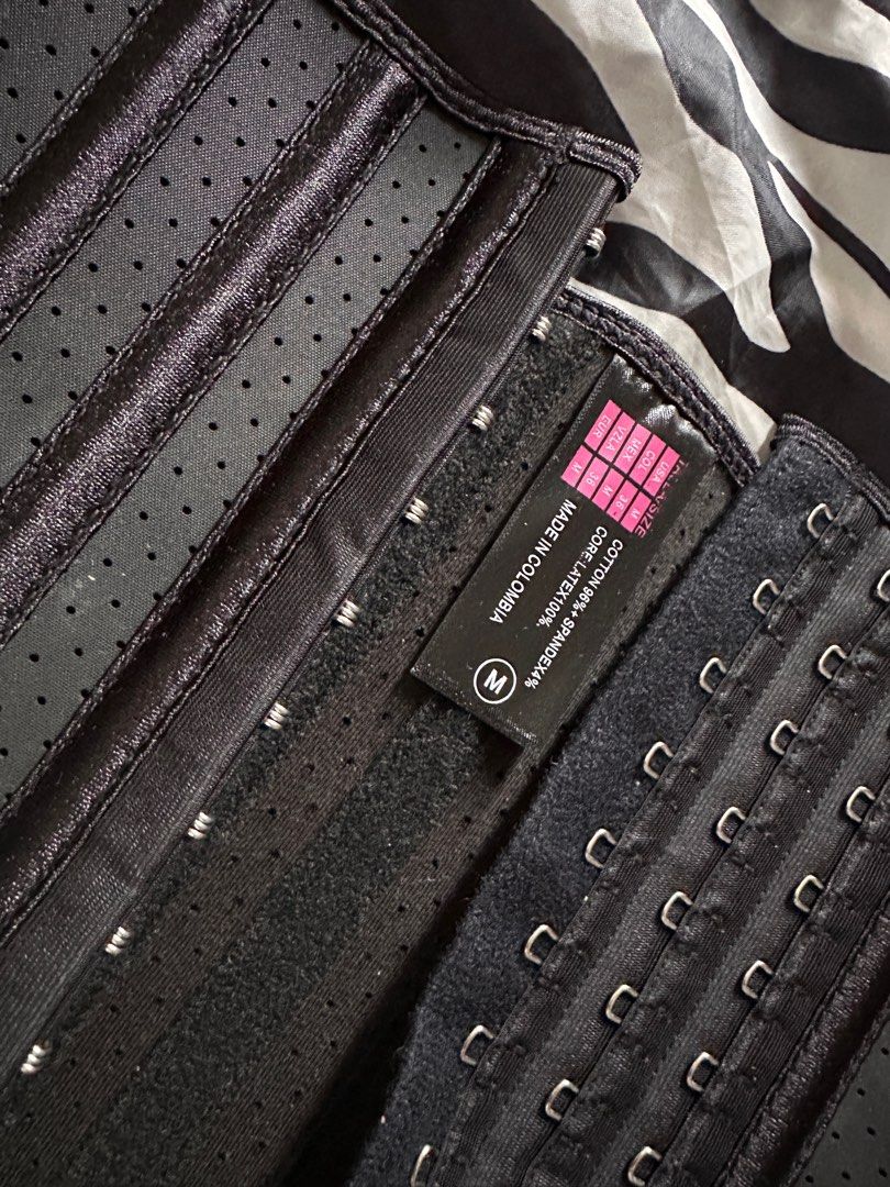 2pcs Colombian Waist Trainer - Size M (Category: Undergarments & Loungewear) located in Minalin. Submitted by misissitri (Listing ID 1403507086, Image 2). Description: - 2pcs Black waist trainers, size M - Like new condition. No rusts on hooks - Made in Colombia - Adjustable compression with multiple hook-and-eye closures - Material: 96% cotton, 4% spandex - Perforated design for breathability - Features straps and front closure.