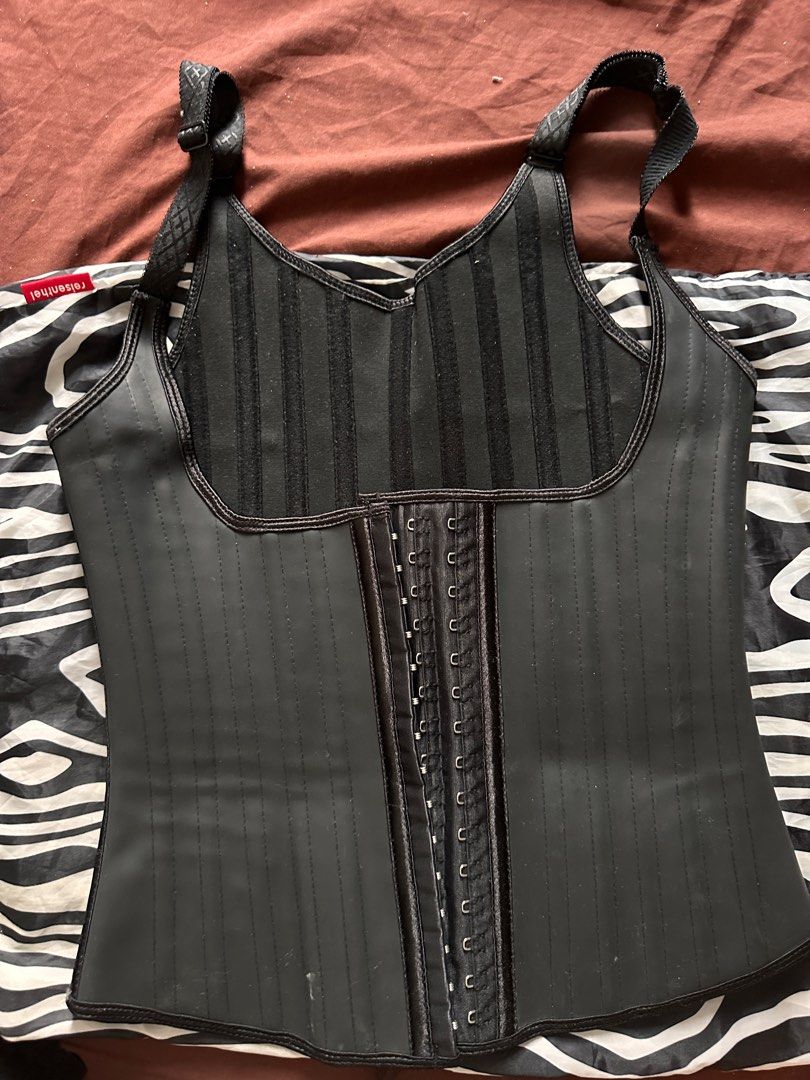 2pcs Colombian Waist Trainer - Size M (Category: Undergarments & Loungewear) located in Minalin. Submitted by misissitri (Listing ID 1403507086, Image 3). Description: - 2pcs Black waist trainers, size M - Like new condition. No rusts on hooks - Made in Colombia - Adjustable compression with multiple hook-and-eye closures - Material: 96% cotton, 4% spandex - Perforated design for breathability - Features straps and front closure.